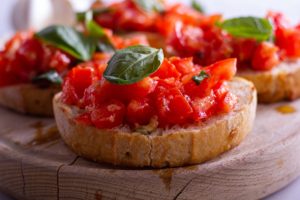 Italian Antipasti in Summertime: Bruschetta Antipasto and Plates, Caprese